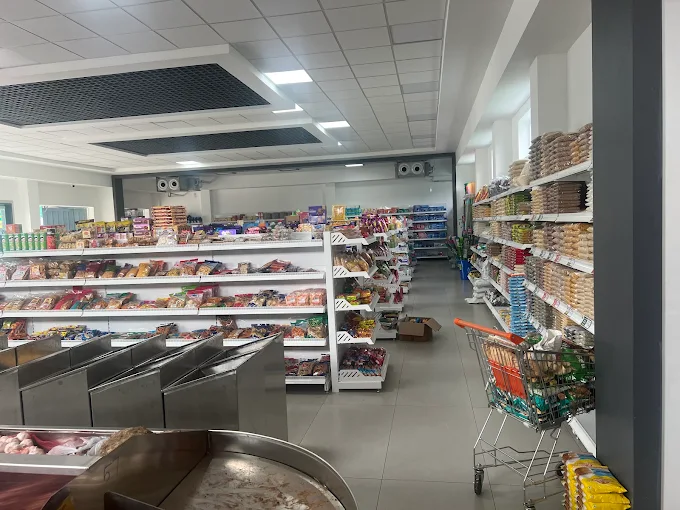 Grocery shelves at NatureBasket.